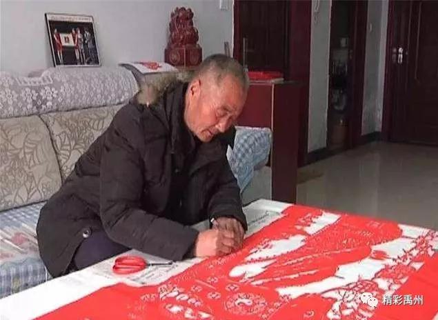 耄耋老人剪纸忙,“十二生肖”来贺岁 耄耋老人剪纸忙,“十二生肖”来贺岁
