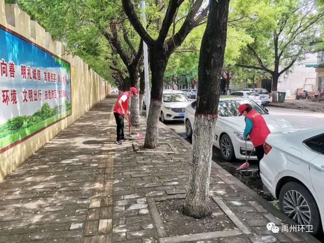 禹州环卫雨后忙清洁 城市依然美 禹州环卫雨后忙清洁 城市依然美