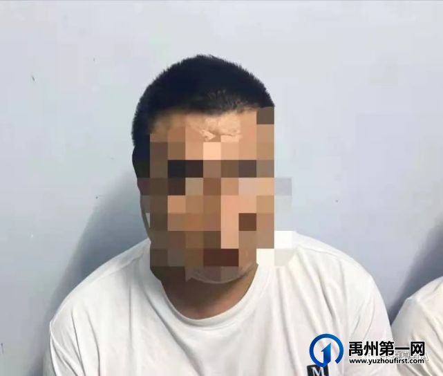 5月28日,禹州警方在市区大同路一宅院内抓获8人 5月28日,禹州警方在市区大同路一宅院内抓获8人