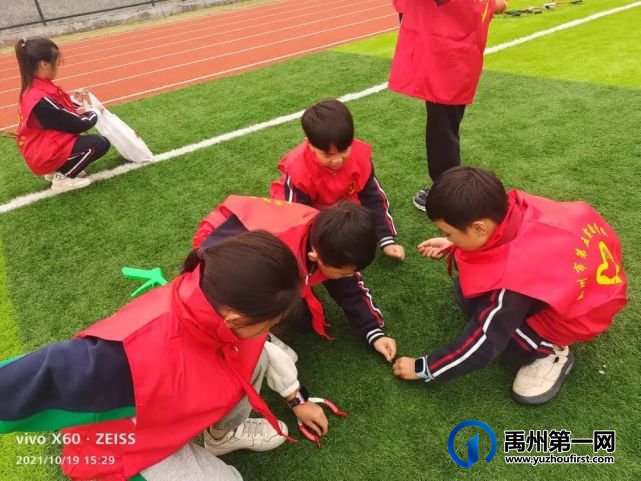 禹州市第五实验学校:文明伴校园 我们在行动 禹州市第五实验学校:文明伴校园 我们在行动