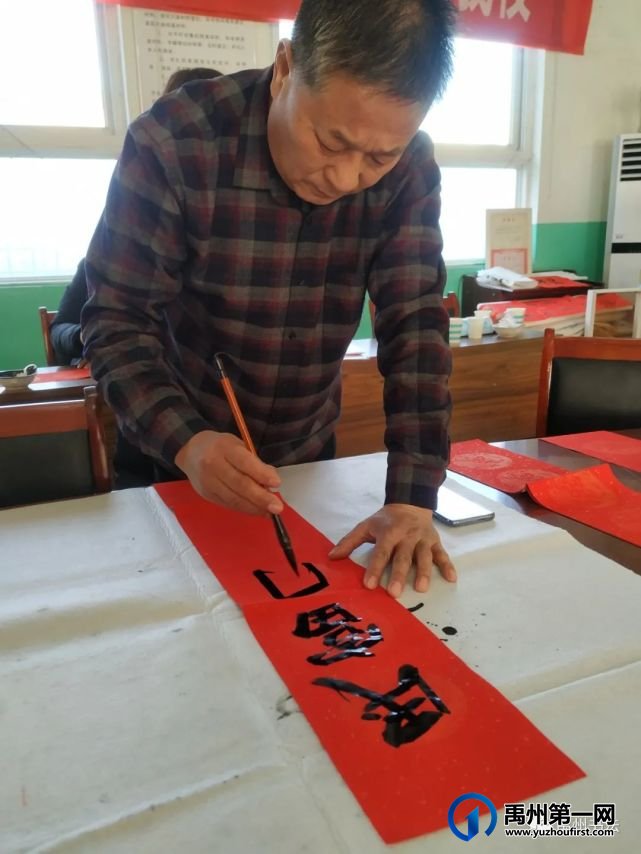 禹州市书协“书法进万家”——走进花石镇中心学校 禹州市书协“书法进万家”——走进花石镇中心学校