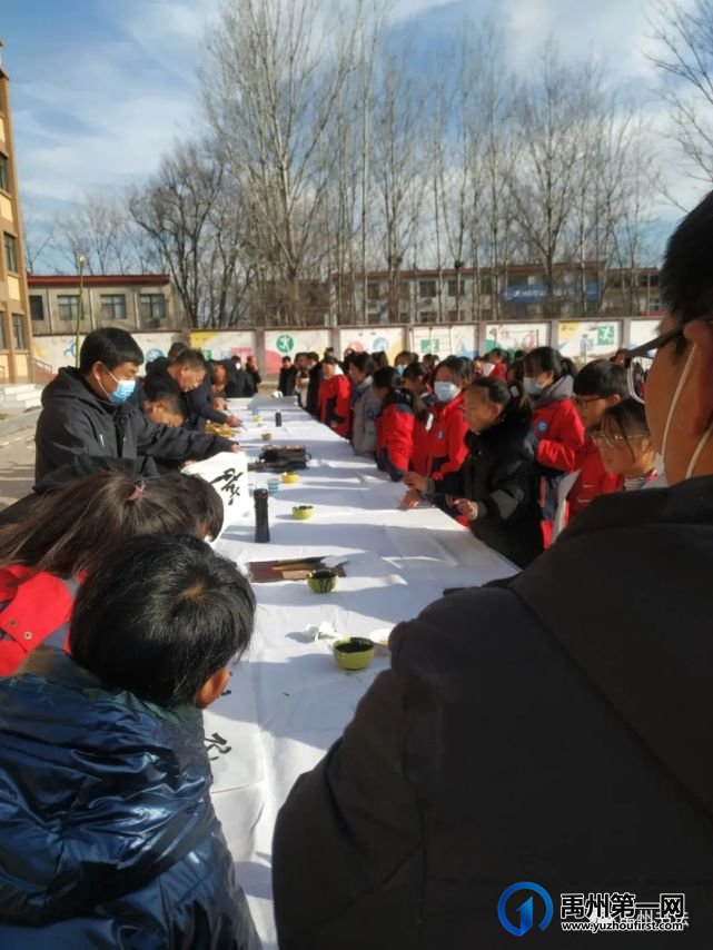 禹州市书协“书法进万家”——走进花石镇中心学校 禹州市书协“书法进万家”——走进花石镇中心学校