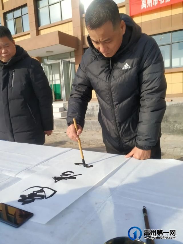 禹州市书协“书法进万家”——走进花石镇中心学校 禹州市书协“书法进万家”——走进花石镇中心学校