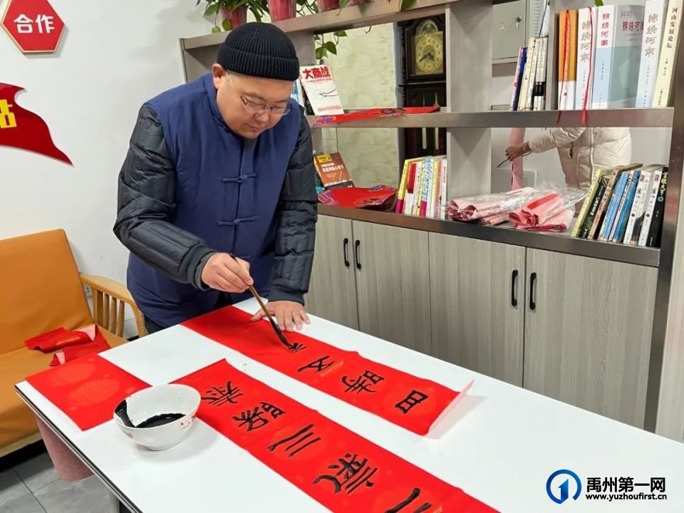 禹州市2025新时代文明实践“百花迎春乐中原”送春联活动正式启动