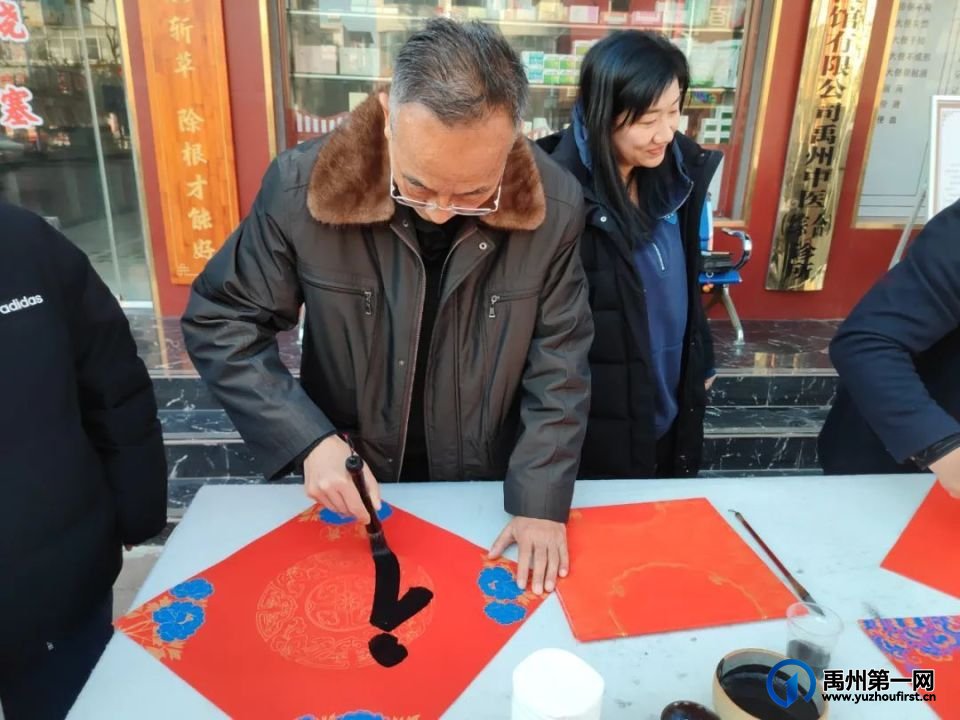 秦九堂携手中原传统书画院开展春节送春联活动 秦九堂携手中原传统书画院开展春节送春联活动