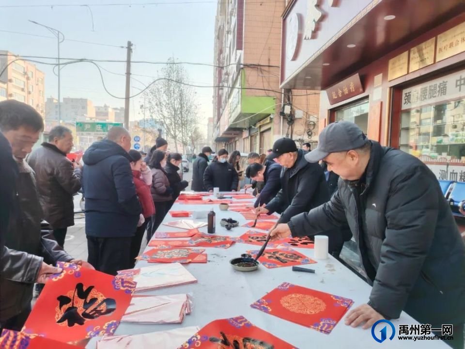 秦九堂携手中原传统书画院开展春节送春联活动 秦九堂携手中原传统书画院开展春节送春联活动